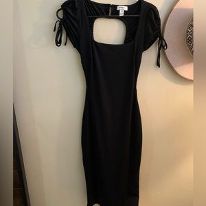 Black open back midi dress.